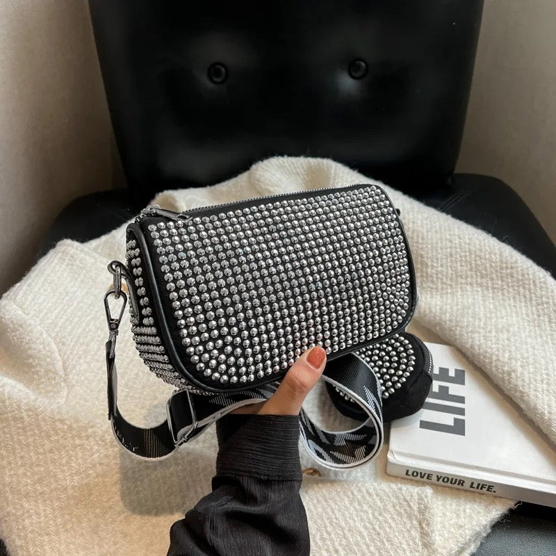 The Glam Sling with adjustable broad belt